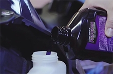 Picture of 2-stroke snowmobile oil for ARTIC CAT